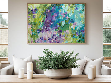 Colourful flower abstract art print hanging in a modern living room