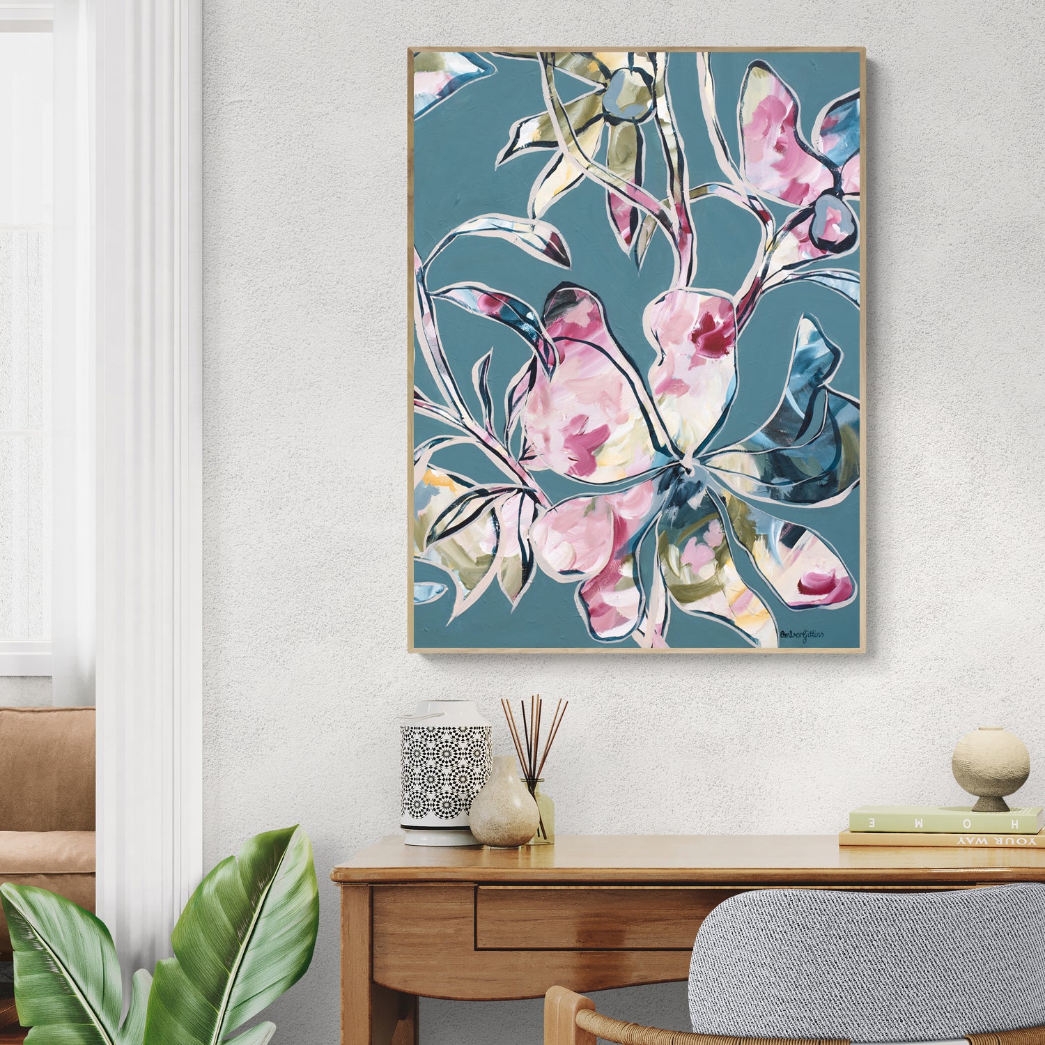 Colourful modern floral abstract canvas wall art print in an eclectic bohemian style. Colour palette of greys, blues, pinks and greens. Framed in a natural frame.