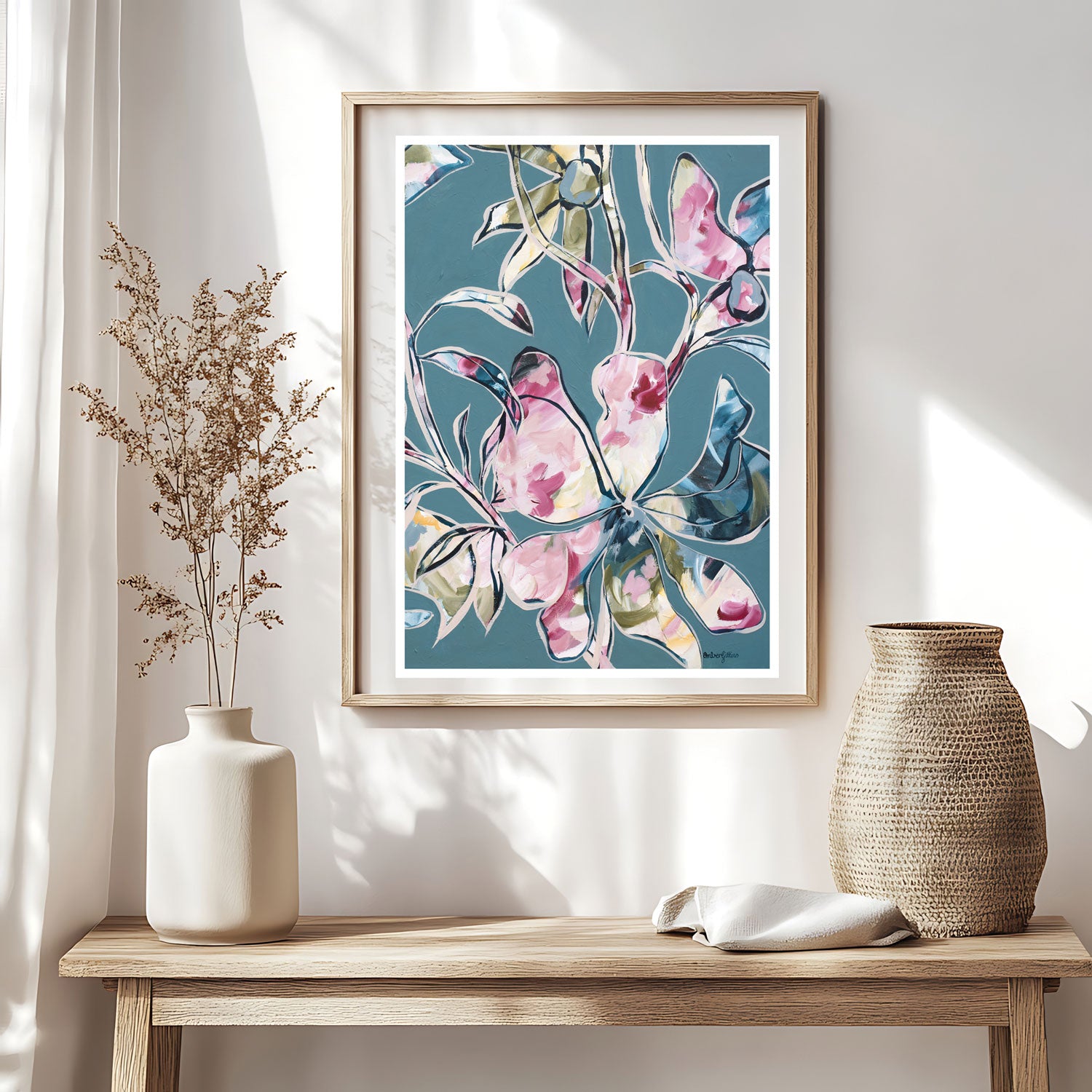 Colourful modern floral abstract wall art print in an eclectic bohemian style. Colour palette of greys, blues, pinks and greens. Framed in a natural frame.
