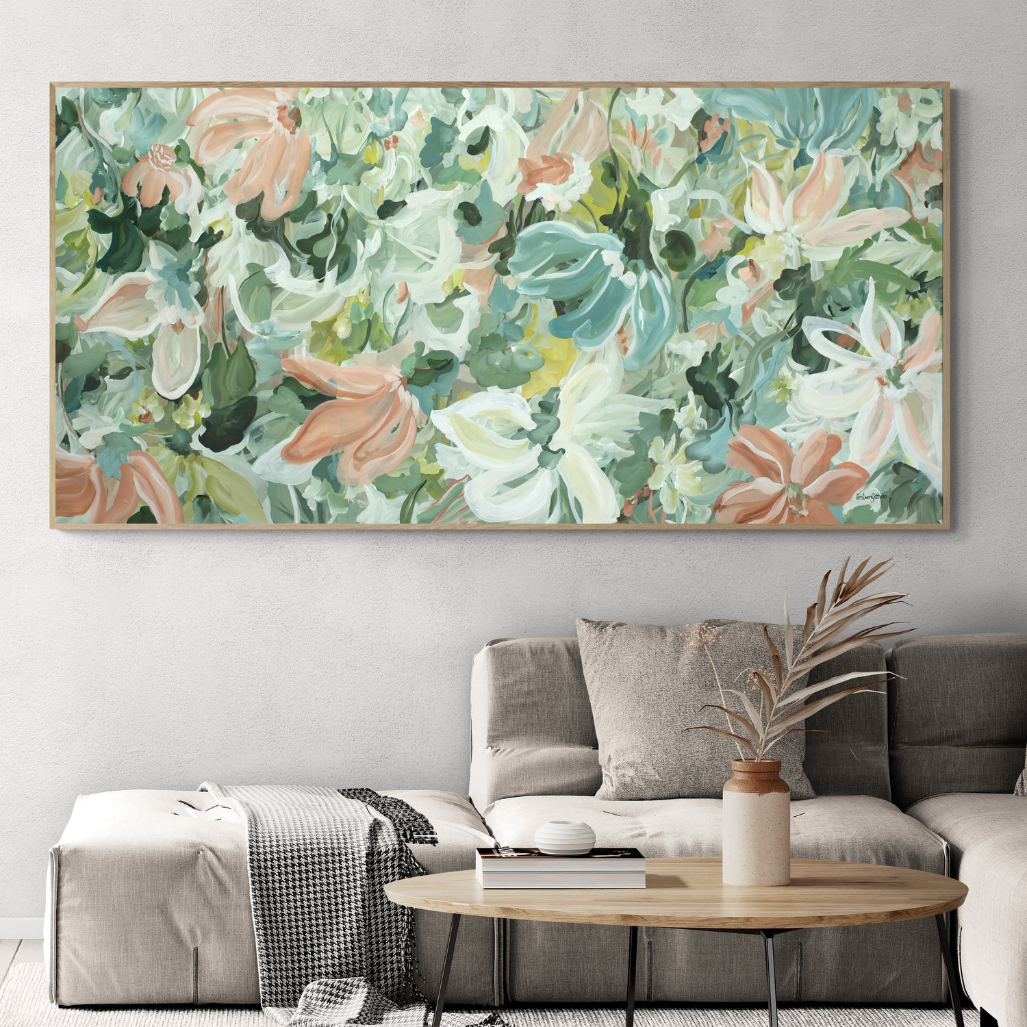 Large original painting of abstract flowers in pastel teal, green and apricot colours. Hanging in a modern neutral lounge room.