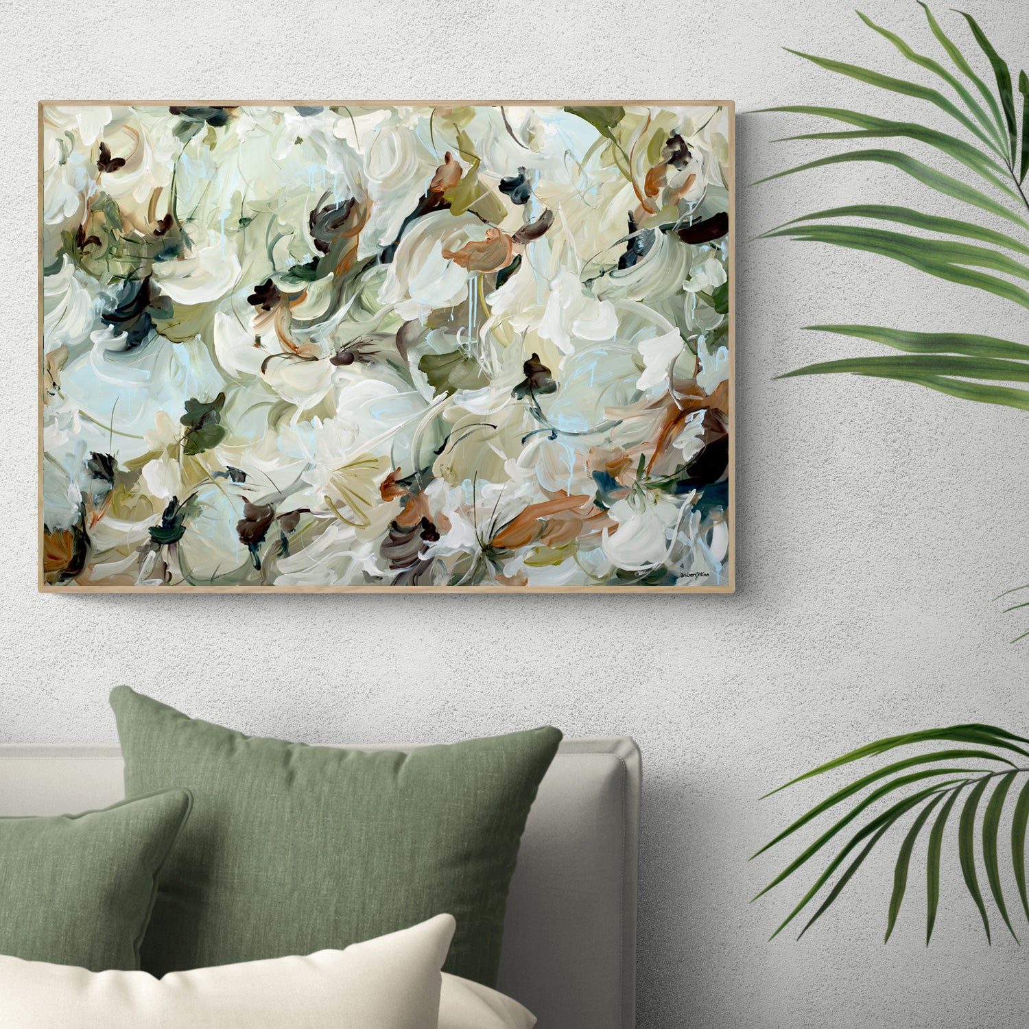 Neutral and tranquil abstract nature fine art prints in beige, cream, olive green and warm browns. Minimal design with interesting layers and movement. Framed and hanging in a modern natural neutral bedroom.