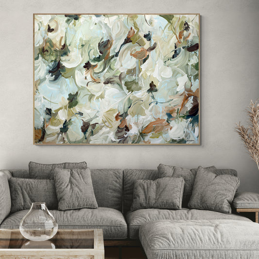 Large neutral coloured of browns and greens, wildflower statement original painting in a living room interior setting.