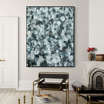 Extra large contemporary abstract painting of abstract natural organic shapes in blue, black and grey colour palette. Hanging in a waiting room.