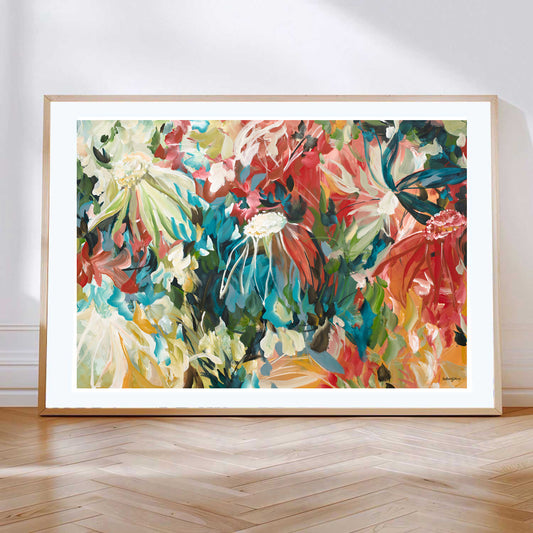 Bold and bright colourful abstract wild flower art print in reds, turquoise and ochre yellows in a natural frame.