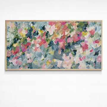 Modern impressionist style canvas print in greys and pinks. Depicting simplified petals and leaves falling to the ground. Framed print with a natural frame.