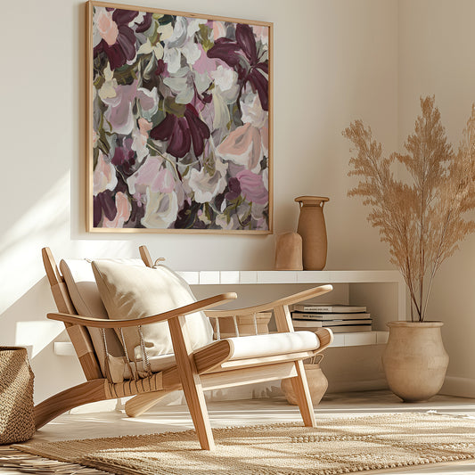 Abstract floral art print in warm earth browns and pinks. Hanging in a modern living room
