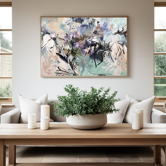 Contemporary abstract fine art print of a flower garden. Expressive style with linear flower shapes and simple solid flower petals in layers. Modern colours of spearmint, purple, beige and browns. Framed in a natural frame that is hanging against a modern lounge room wall.