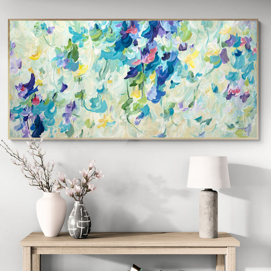 Modern colorful flower original art hanging on a living room wall