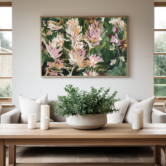 Large modern abstract flower fine art canvas print hanging in a contemporary living room