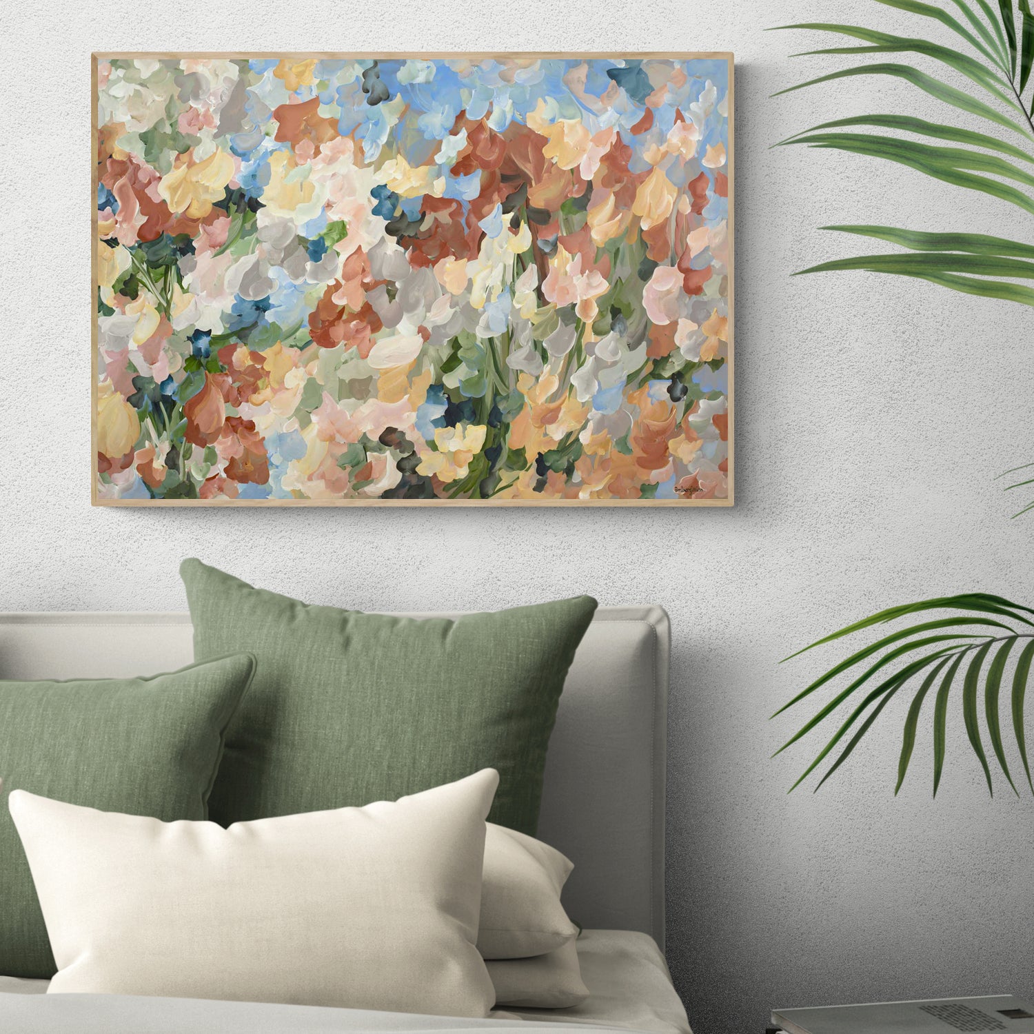Colourful autumn inspired abstract canvas print of a garden of falling leaves and flower petals in a minimal impressionist style in browns, light blue, warm yellow and green.