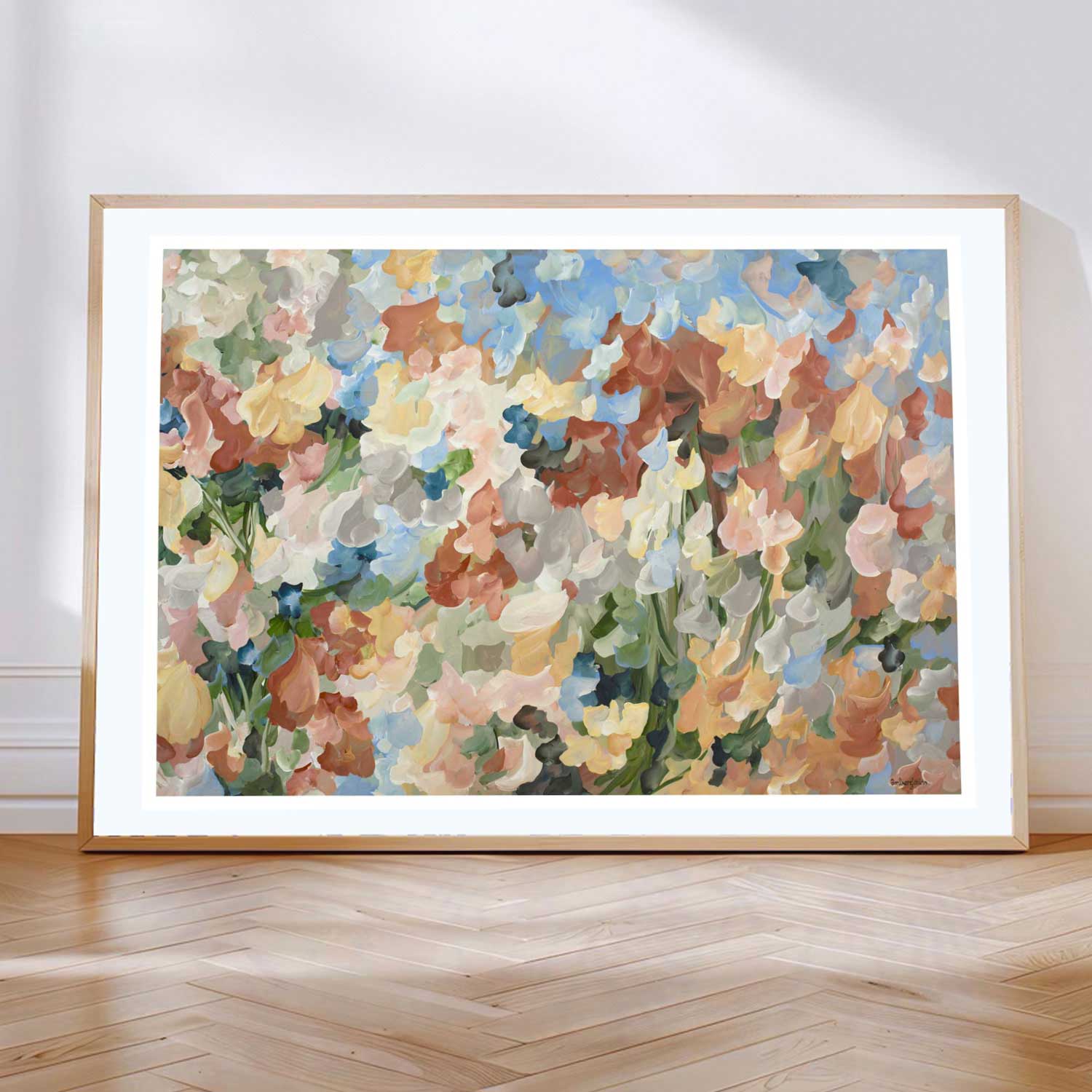 Colourful autumn inspired abstract canvas art print of a garden of falling leaves and flower petals in a minimal impressionist style in browns, light blue, warm yellow and green.