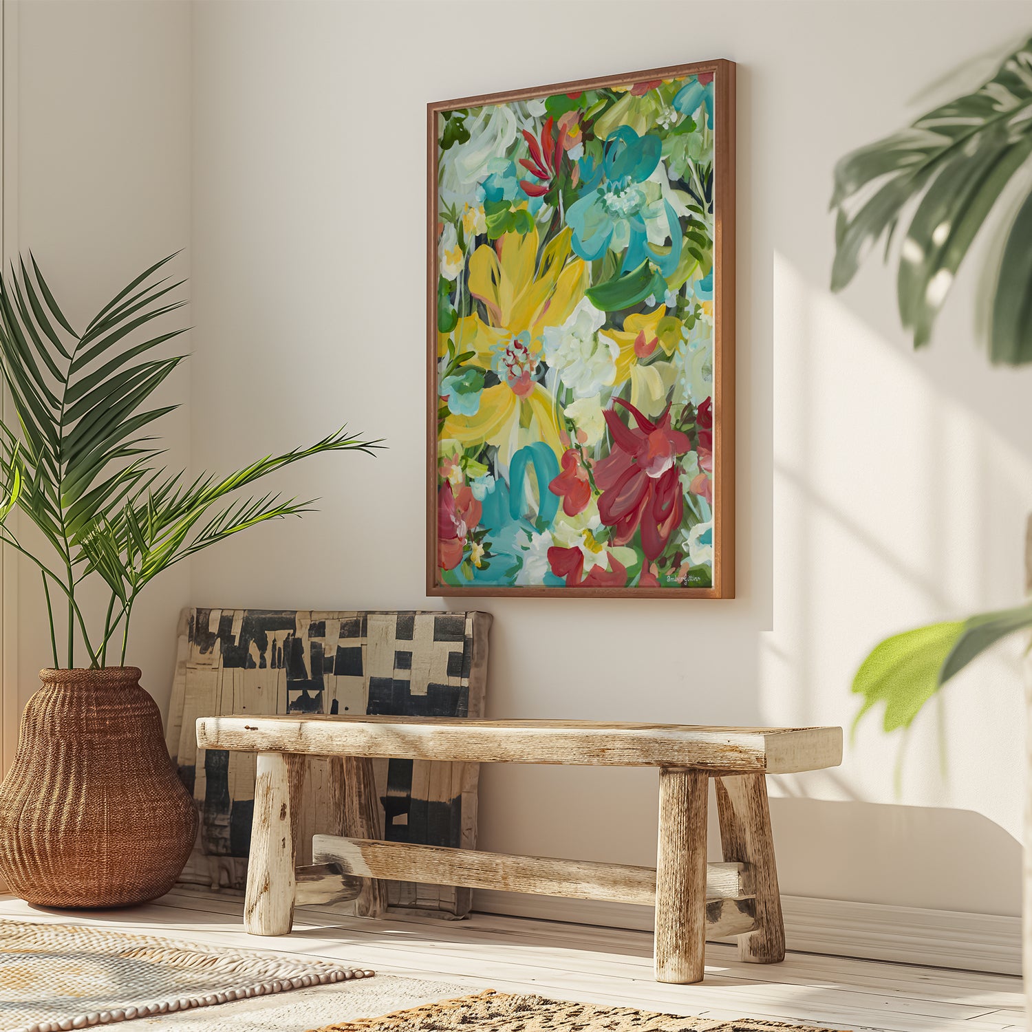 Colourful abstract flower art print hanging against a modern living room wall.