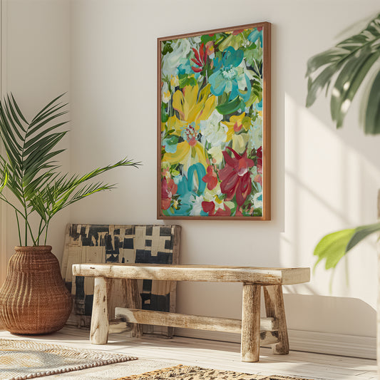 Colourful abstract flower art print hanging against a modern living room wall.