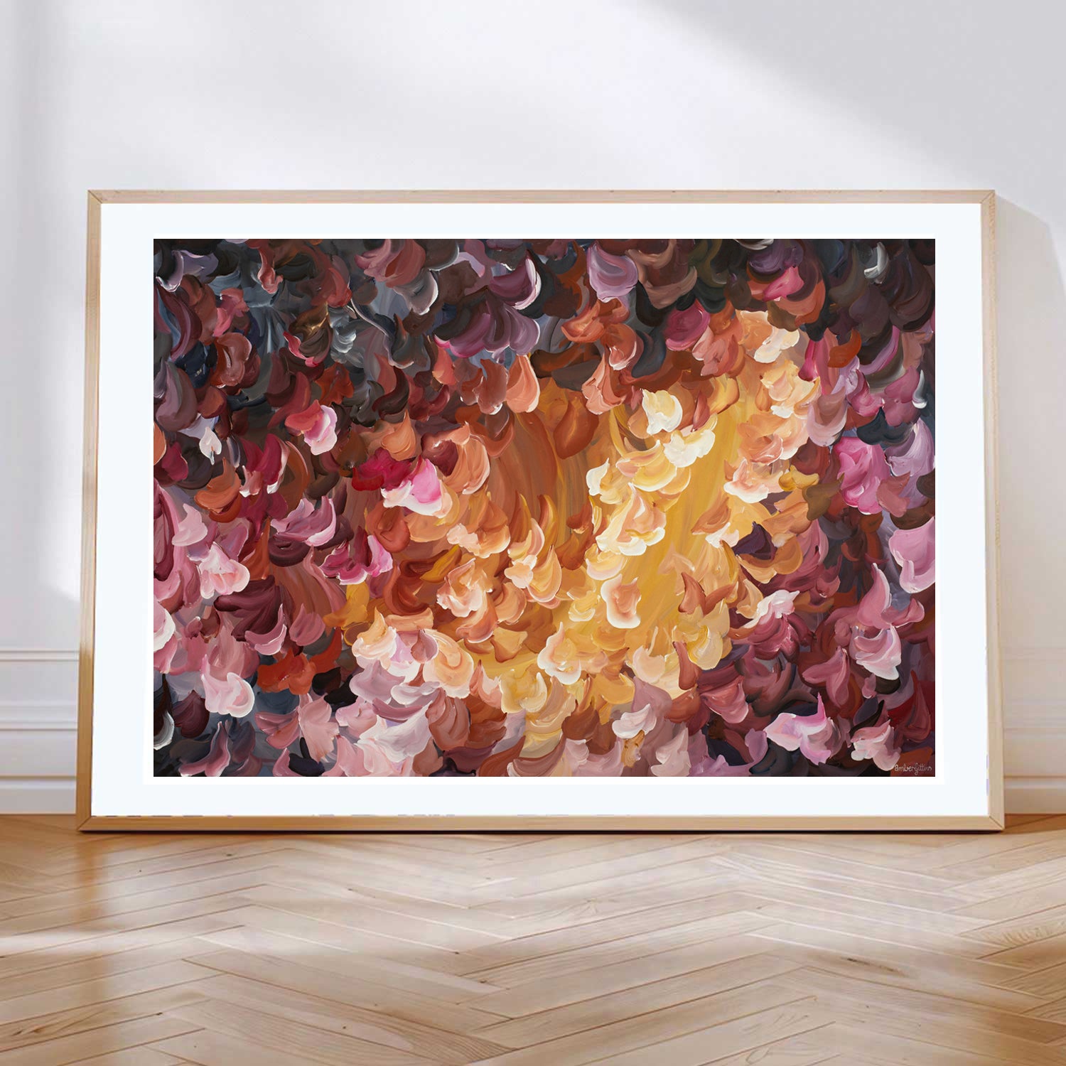 Fiery red and orange abstract flower art print with a natural frame.