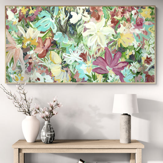 Colourful wildflower abstract art with a natural frame, hanging in a living room.