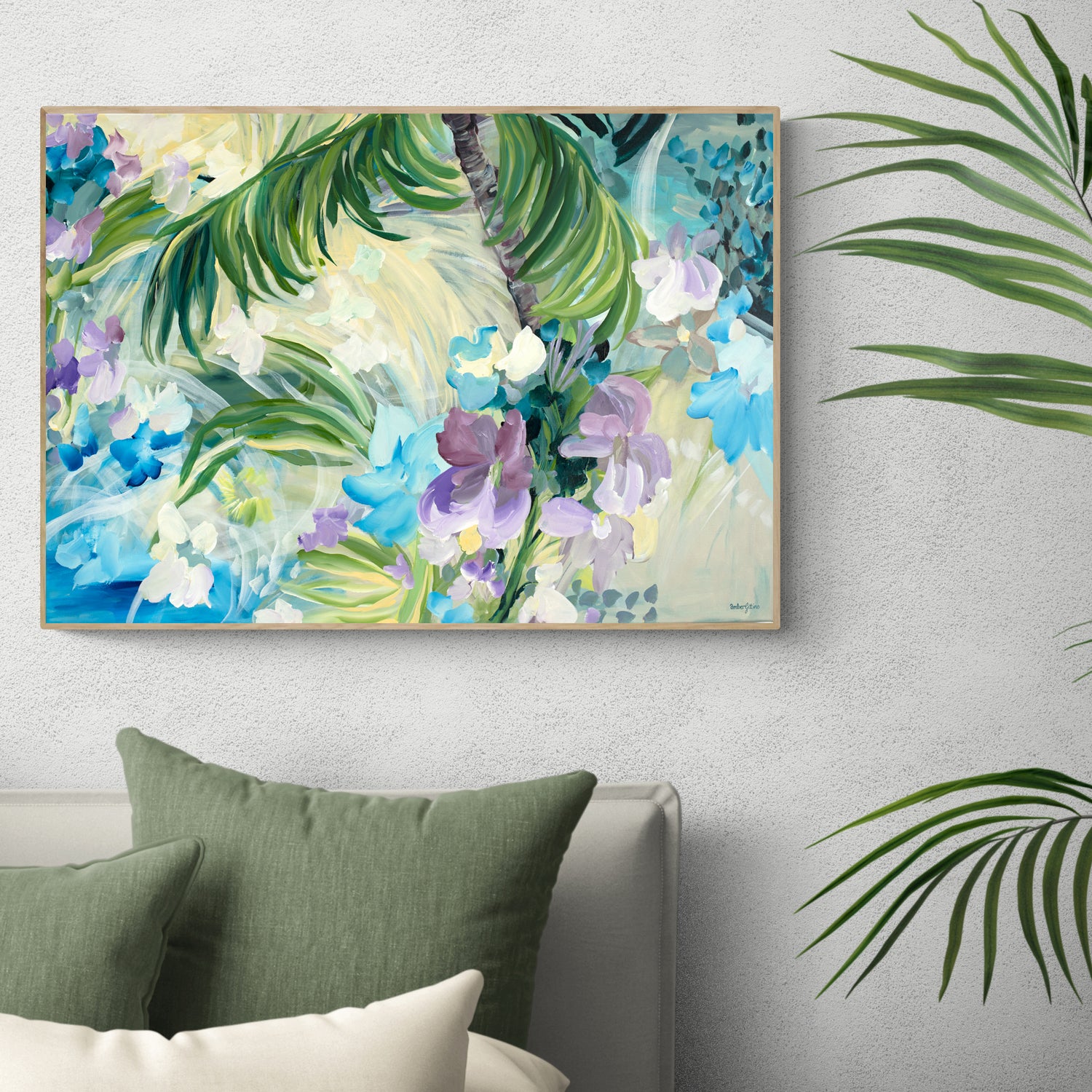Tropical flower and palm tree abstract canvas wall art print in blues, lilac purple, greens and yellow. Hanging on a bedroom wall