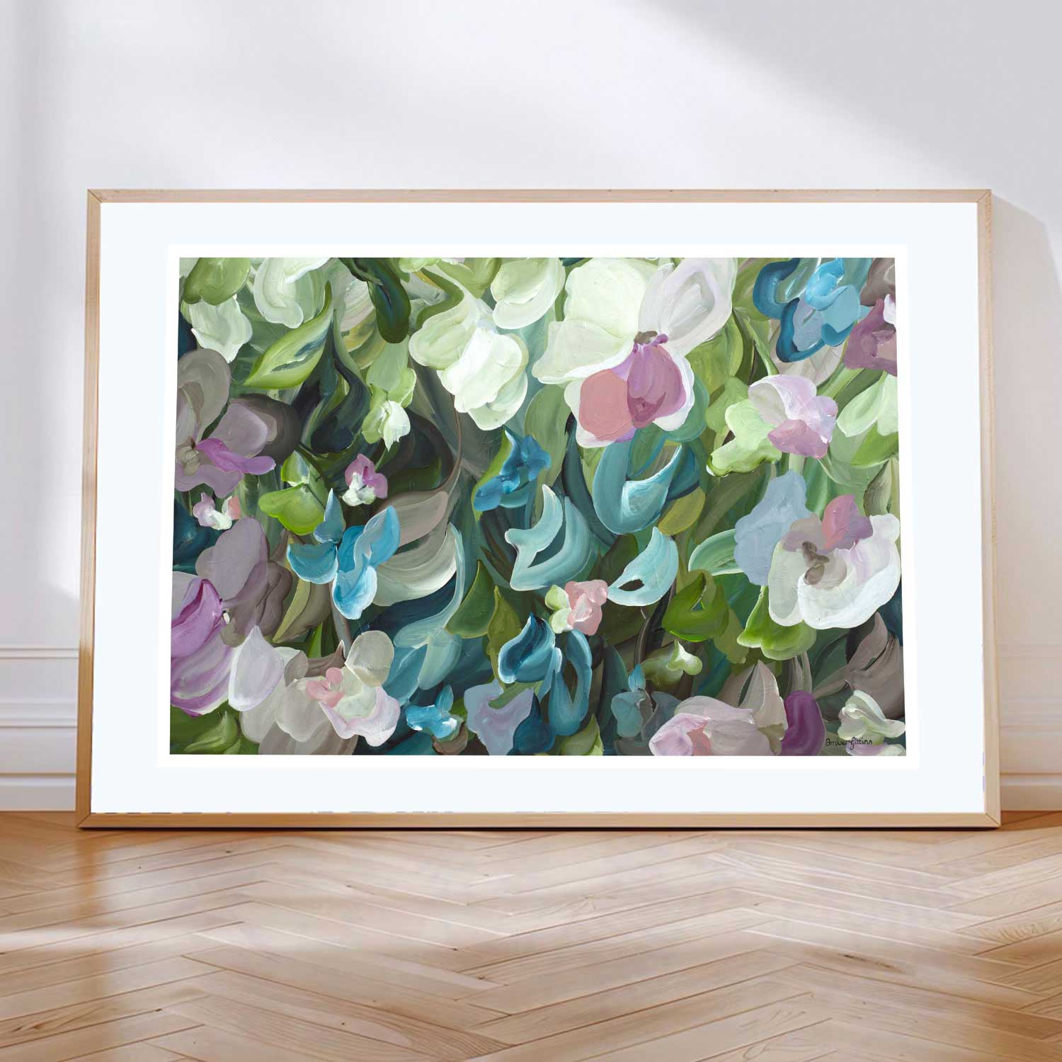 Pretty modern impressionist style abstract floral wall art print in greens, turquoise and pink colours. Framed in a natural frame.