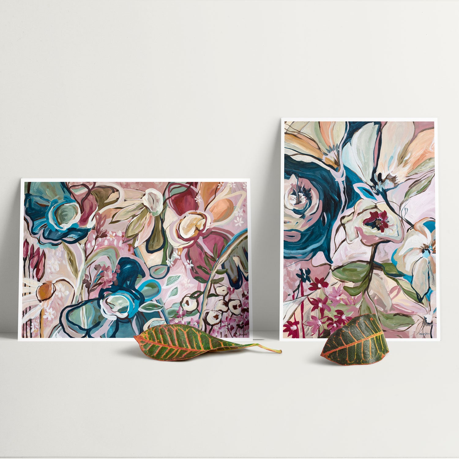 Colourful vintage boho flower poster print set of 2. Modern contemporary painting turned into a print. Linear and organic flowing petals. Pastel colour palette of pink, dark blue, army green and burgundy. Two piece wall art for your home decorating.