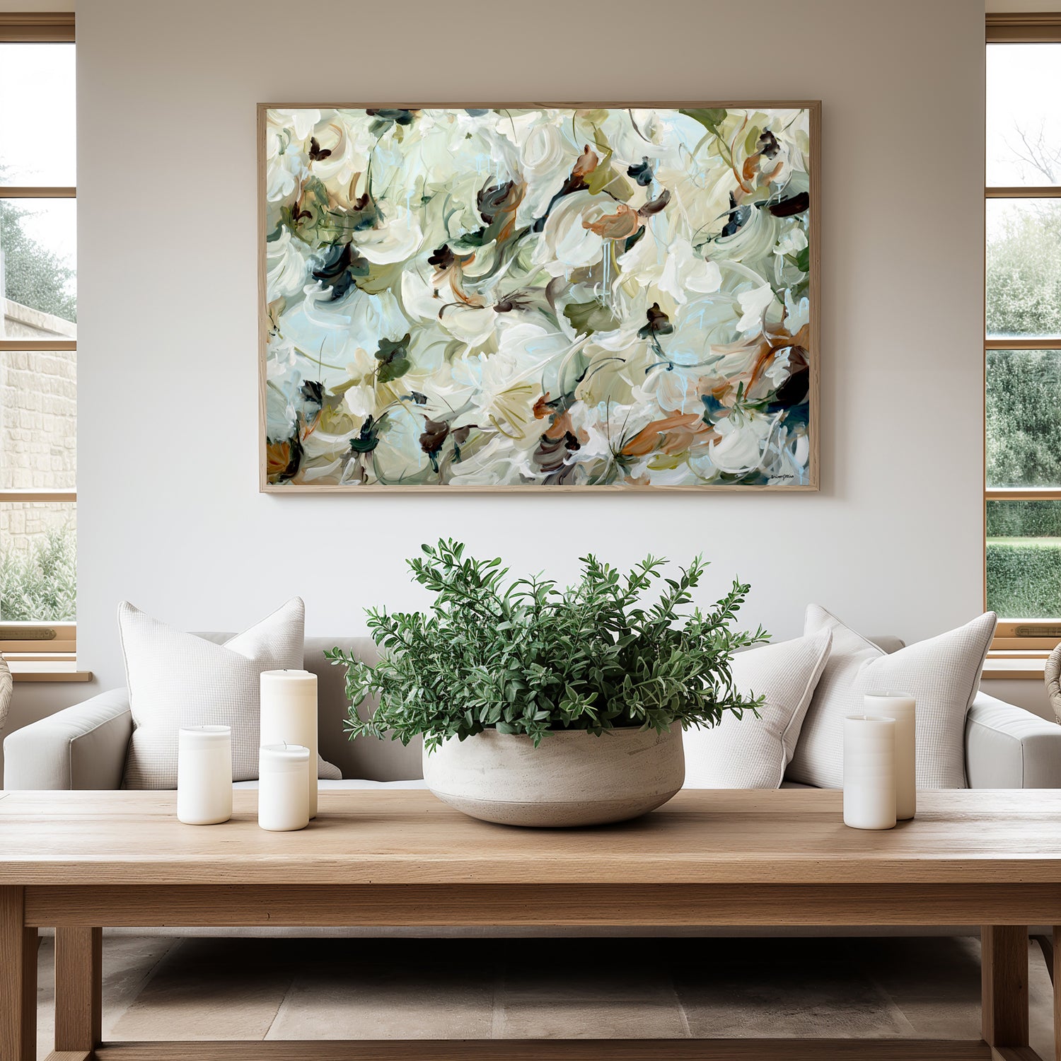 Neutral and tranquil abstract nature fine art prints in beige, cream, olive green and warm browns. Minimal design with interesting layers and movement. Framed and hanging in a modern natural neutral living room.