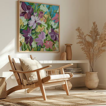 Colourful flower fine art print in a modern layered style with purple, green, pink, blue and warm yellow colours. Framed in a natural frame hanging in a modern neutral lounge room.