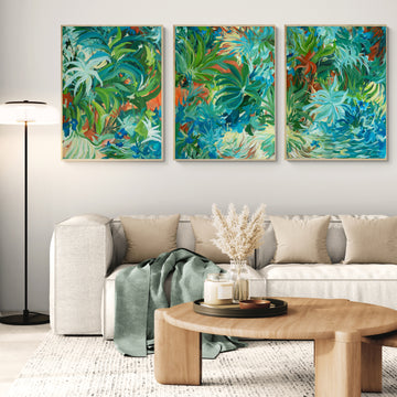 Living room with a beige sofa, wooden coffee table, and three colourful tropical abstract paintings on the wall.